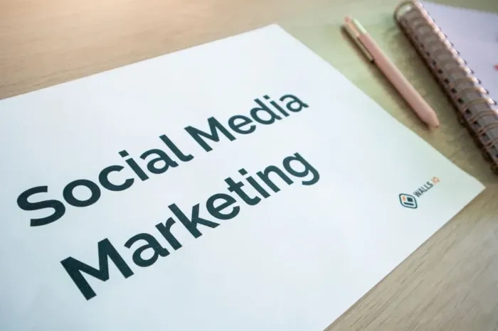 A marketing planner schedules a campaign timeline in a notebook