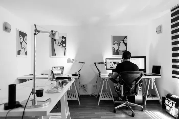 Coworkers sharing experience and updating work methods together
